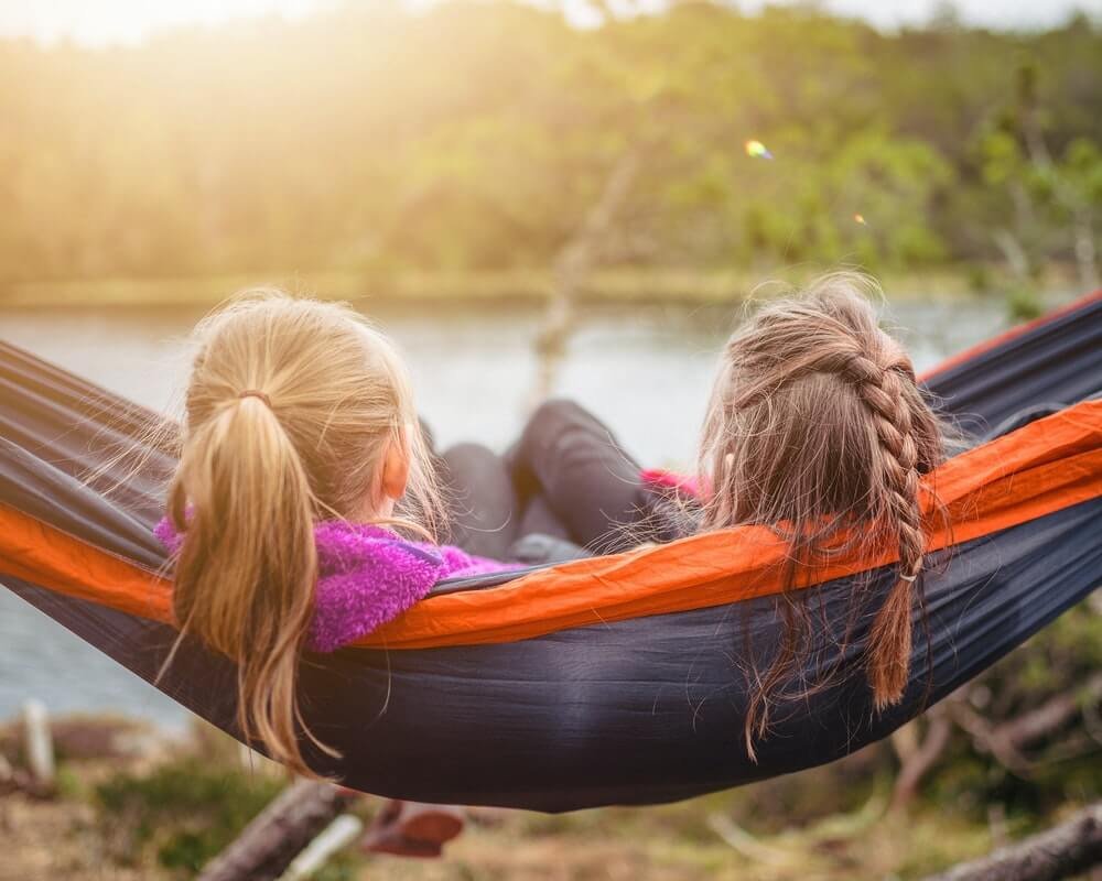 Two girls in hammock